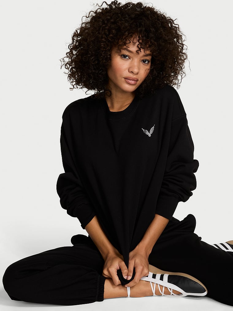 Victoria's Secret, Angel Essentials Iconic Fleece Crewneck Sweatshirt, Black, onModelFront, 1 of 4