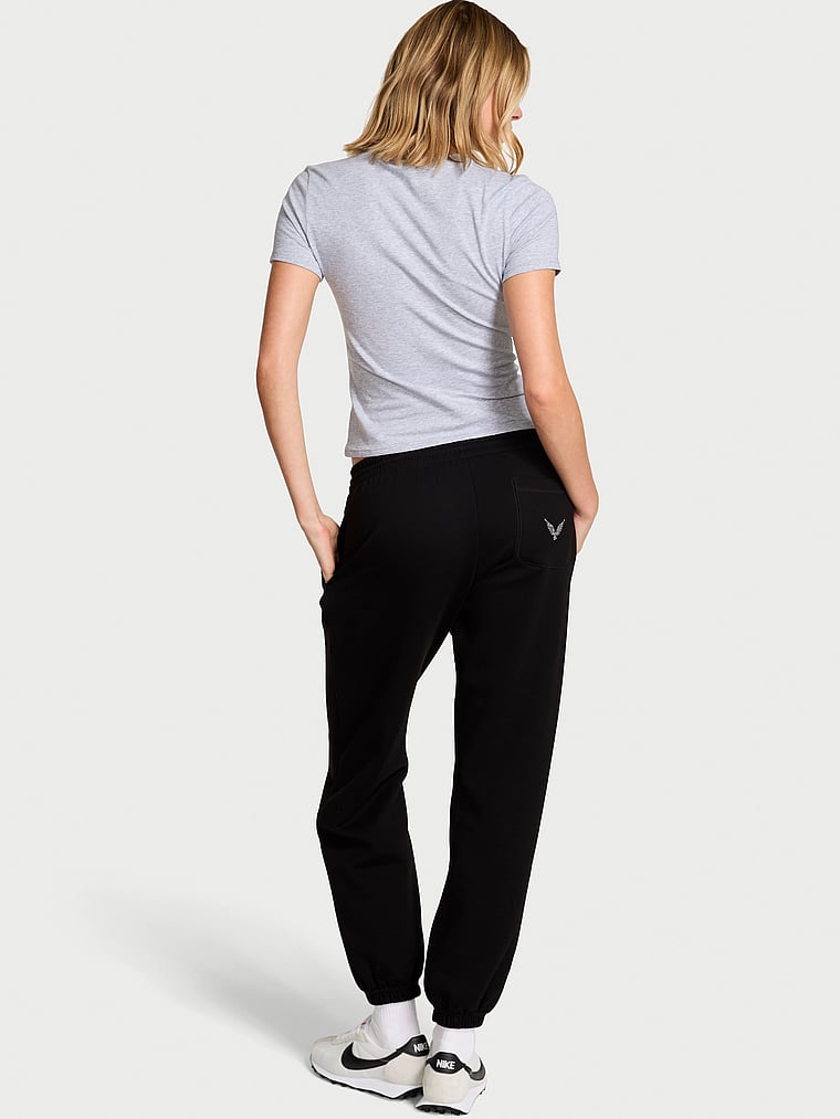 Victoria's Secret, Angel Essentials Off-Duty Fleece Jogger Sweatpant, Pure Black, onModelBack, 3 of 4 Aga is 5'10" and wears Small