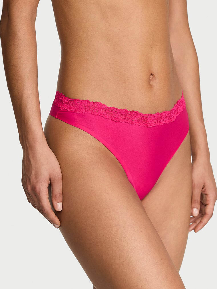 Victoria's Secret, Body by Victoria Body by Victoria Flex Mid-Rise Thong Panty, Pop Pink, onModelFront, 1 of 4