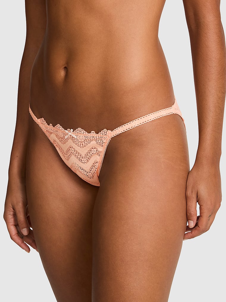 PINK PINK Wink™ String Bikini Panty, Peach Tree, onModelFront, 1 of 4 Vanessa is 5'10" or 178cm and wears Small