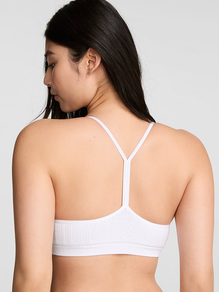 PINK AnyWear Low-Scoop Racerback Bra, White, onModelBack, 2 of 3 Gloria is 5'9" or 175cm and wears 34D or Small