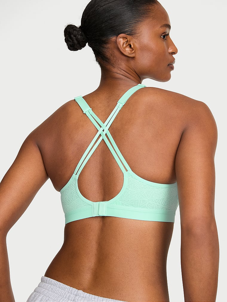 Victoria's Secret, VSX VSX Angel™ Sports Bra, Waterfall, onModelBack, 2 of 3 Tsheca  is 5'9" and wears 34B or Small