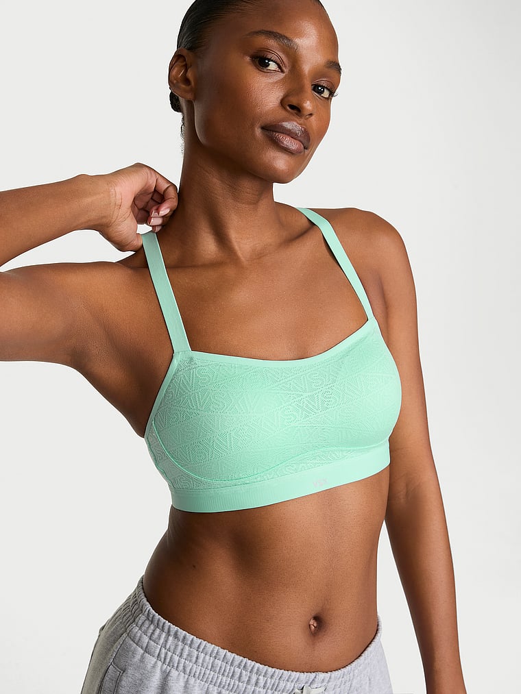 Victoria's Secret, VSX VSX Angel™ Sports Bra, Waterfall, onModelFront, 1 of 3 Tsheca  is 5'9" and wears 34B or Small