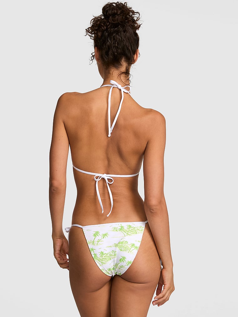 PINK SWIM Side-Tie Cheeky Bikini Bottom, Tropical Toile Limesicle, onModelFront, 1 of 4 Rae is 5'10" and wears Small