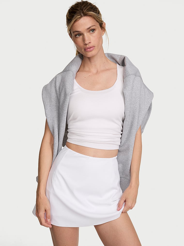 Victoria's Secret, VSX VSX Elevate™ Mini Skirt, VS White, onModelFront, 1 of 4 Tsheca is 5'9" or 175cm and wears Small