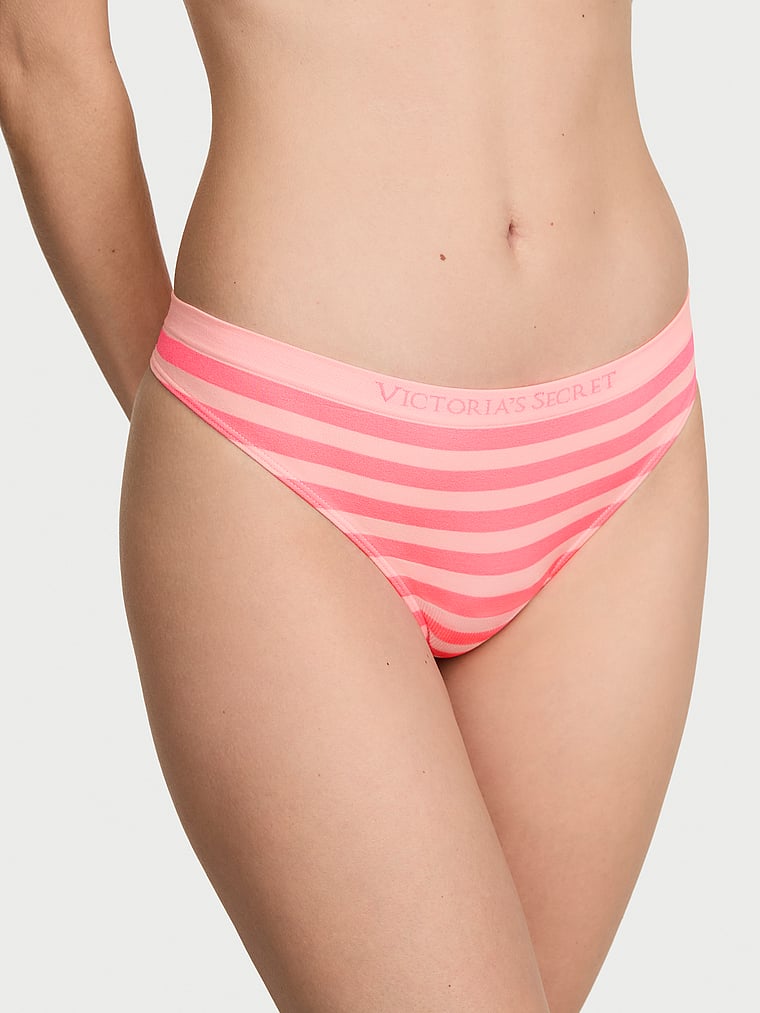 Victoria's Secret, Seamless Seamless Heart Stripe Thong Panty, Pink Highlighter Beach Stripe, onModelFront, 1 of 3 Maggie is 5'7" and wears Small