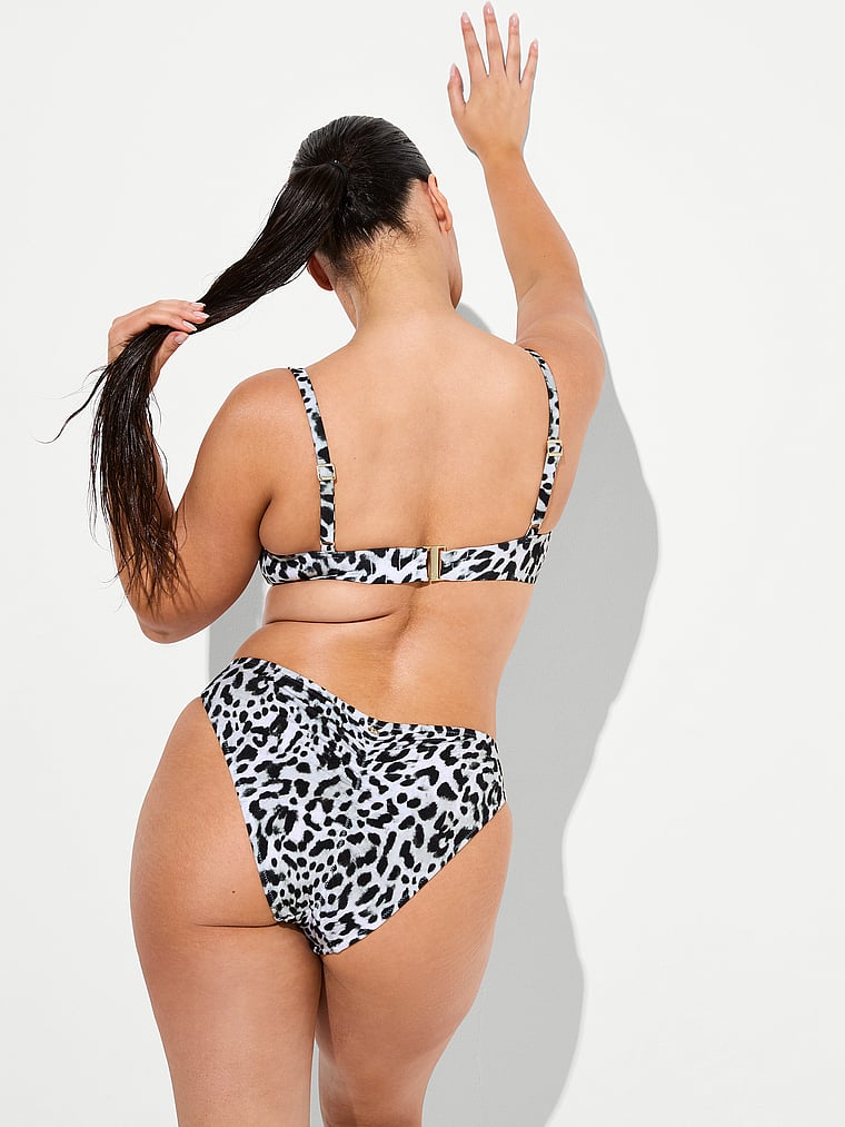 Victoria's Secret, Victoria's Secret Swim Ruched Cheeky Bikini Bottom, Snow Leopard, onModelFront, 1 of 3 Karmi is 5'10" or 178cm and wears Large
