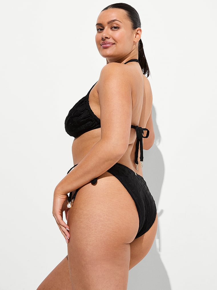 Victoria's Secret, Victoria's Secret Swim Eyelet Side-Tie Brazilian Bikini Bottom, Black, onModelFront, 1 of 3 Karmi is 5'10" and wears Large