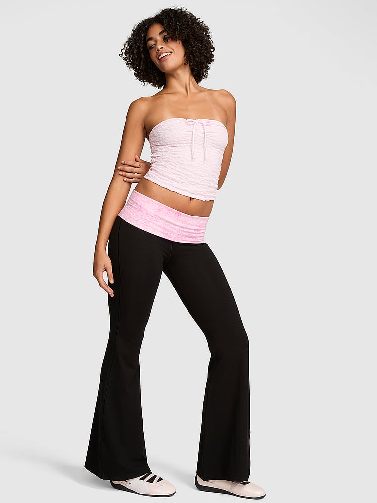 PINK All-Day Cotton™ Foldover Super Flare Leggings, Black and Pink Leopard Bling, onModelBack, 2 of 3 Vanessa is 5'10" or 178cm and wears Small