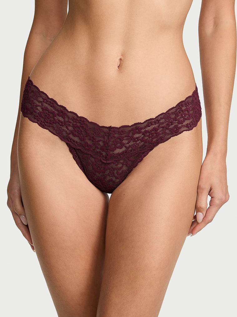 Victoria's Secret, The Lacie Lace Lace-Up Thong Panty, Pink, onModelFront, 1 of 3 Ari is 5'9" and wears Small