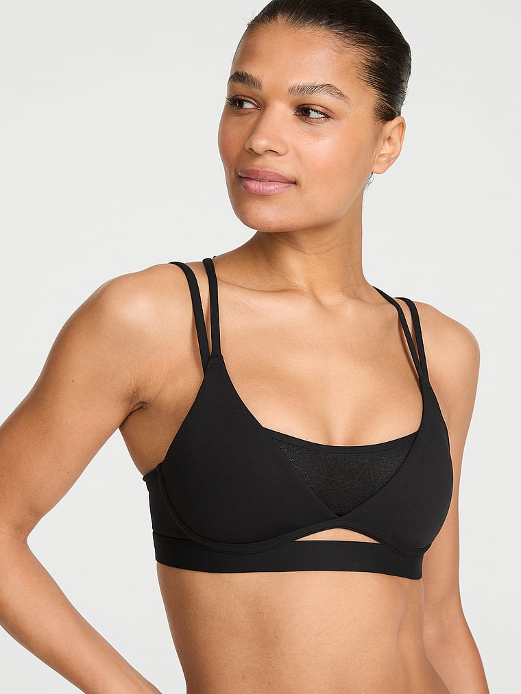 Victoria's Secret, VSX VSX Elevate™ Strappy Plunge Sports Bra, Black, onModelFront, 1 of 3
