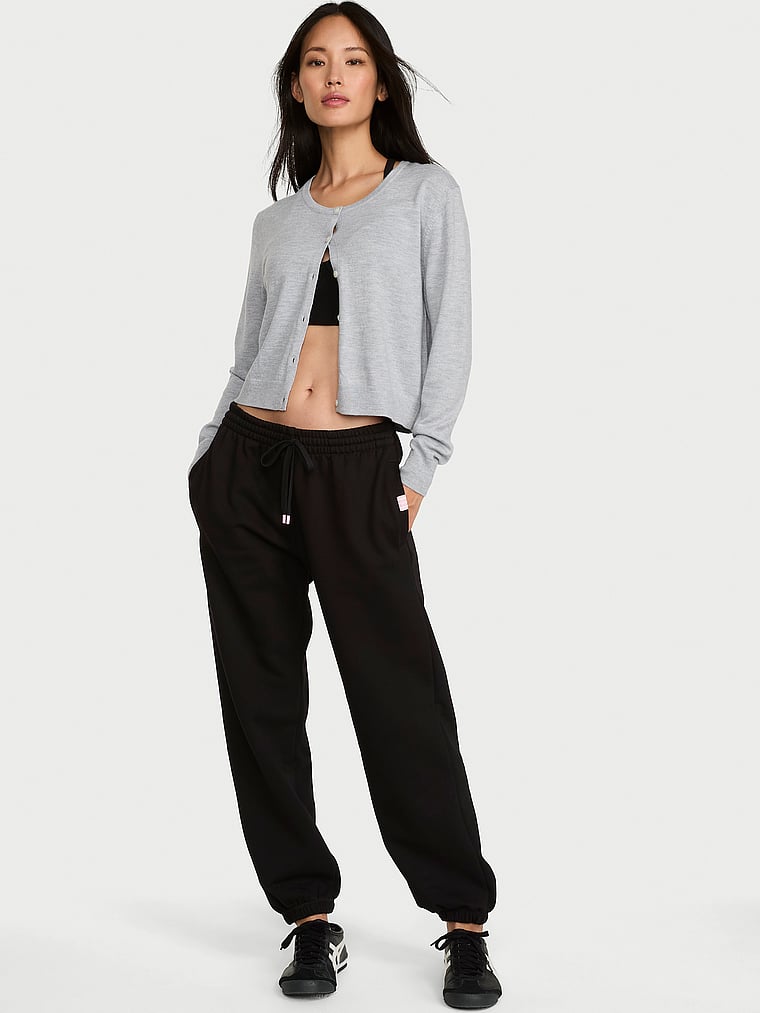 Victoria's Secret, Angel Essentials Iconic Fleece Relaxed Jogger Sweatpant, Black, onModelFront, 1 of 3
