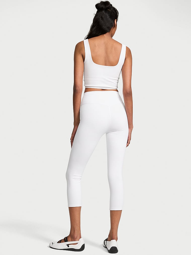 Victoria's Secret, VSX VSX Incredible Coverage™ Crop Legging, Vs White, onModelBack, 2 of 5 Shaanti is 5'9" or 175cm and wears Small