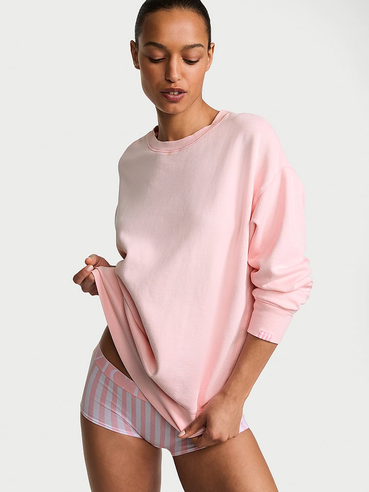 Victoria's Secret, Angel Essentials Iconic Fleece Crewneck Sweatshirt, Angel Pink, onModelFront, 1 of 3 Nikita  is 5'10" or 178cm and wears Small