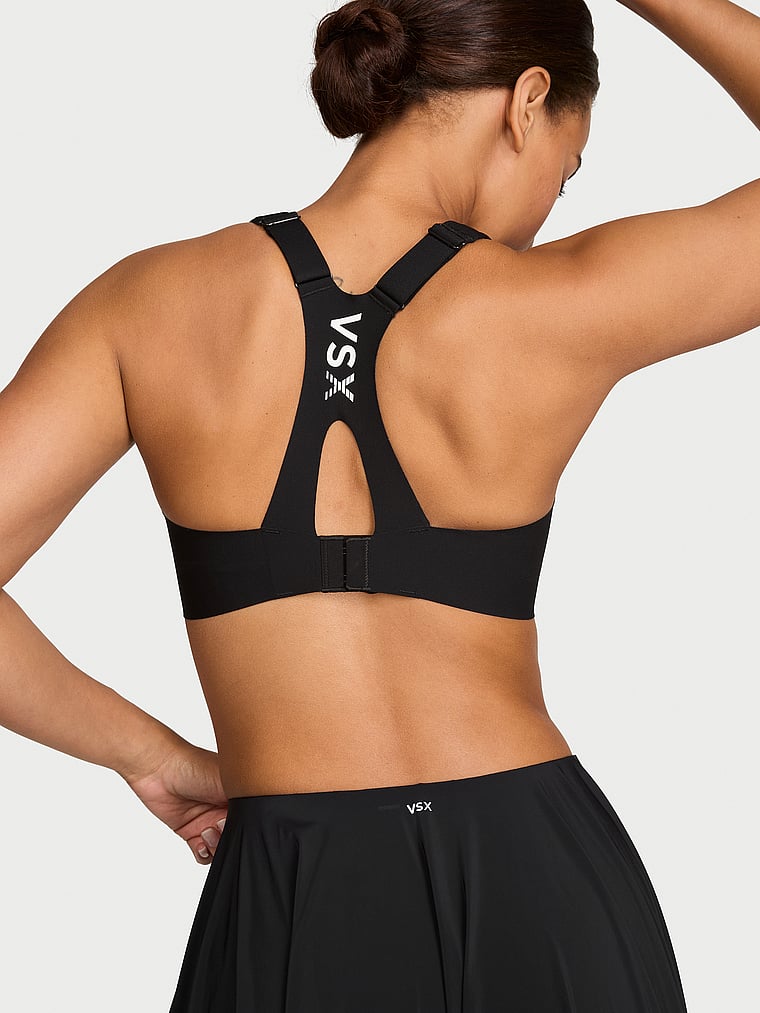 Victoria's Secret, VSX VSX RacketCool™ Racerback Sports Bra, Black & White, onModelBack, 2 of 3 Nisaa is 5'9" or 175cm and wears 34B or Small