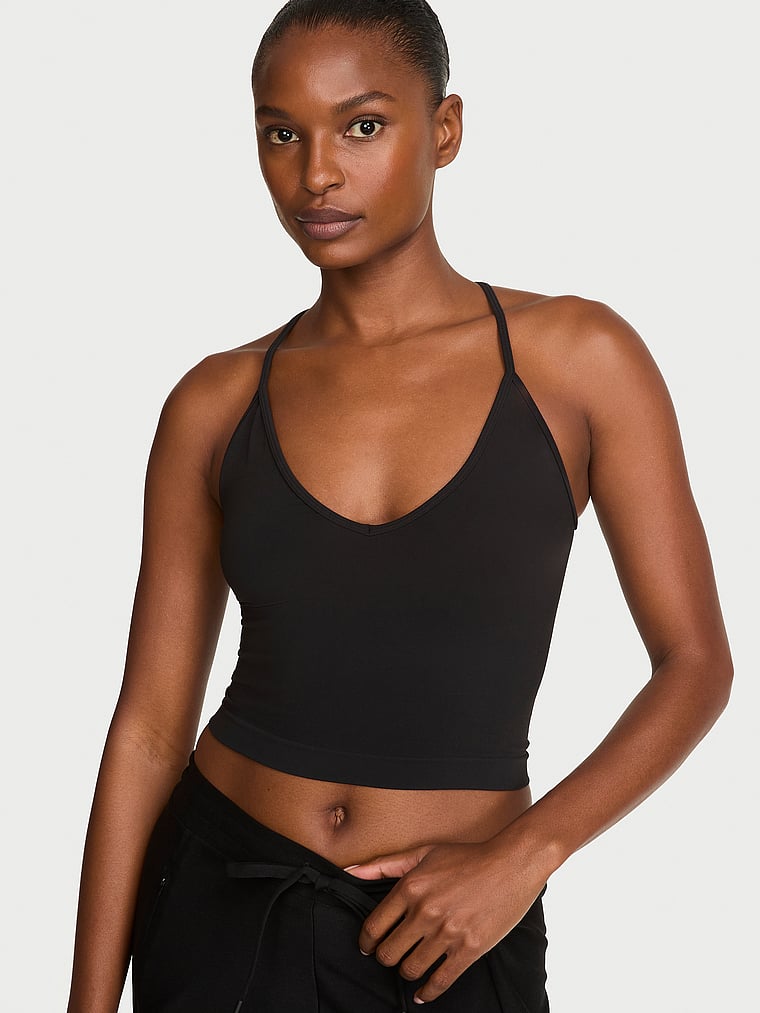 Victoria's Secret, Victoria's Secret Smooth Seamless Racerback Tank Top, Black, onModelFront, 1 of 3 Tsheca is 5'9" and wears Small