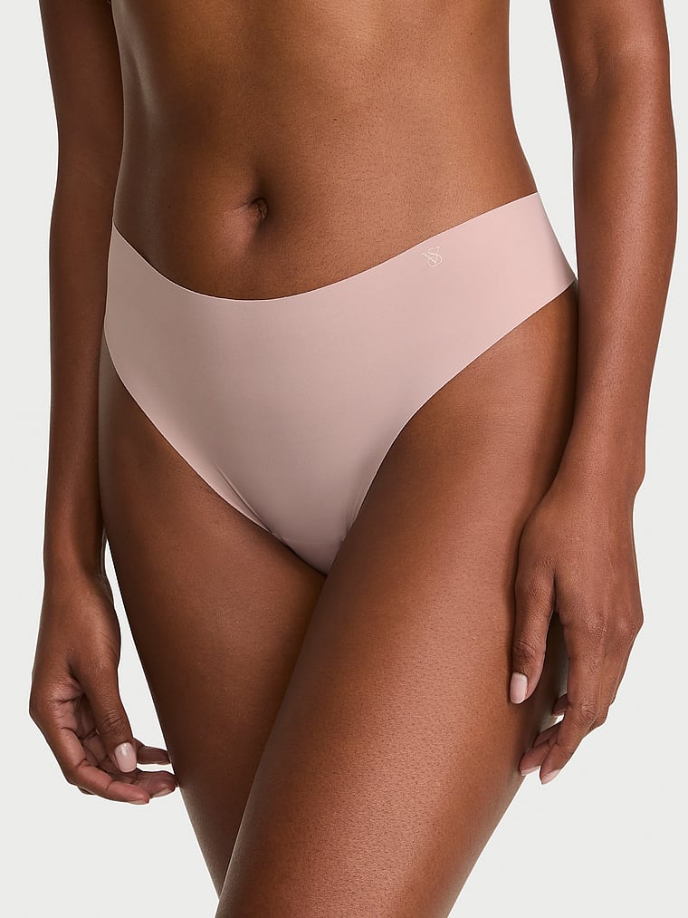 Victoria's Secret, No-Show No-Show Mid-Rise Thong Panty, Talc, onModelFront, 1 of 4 Tsheca  is 5'9" or 175cm and wears Small