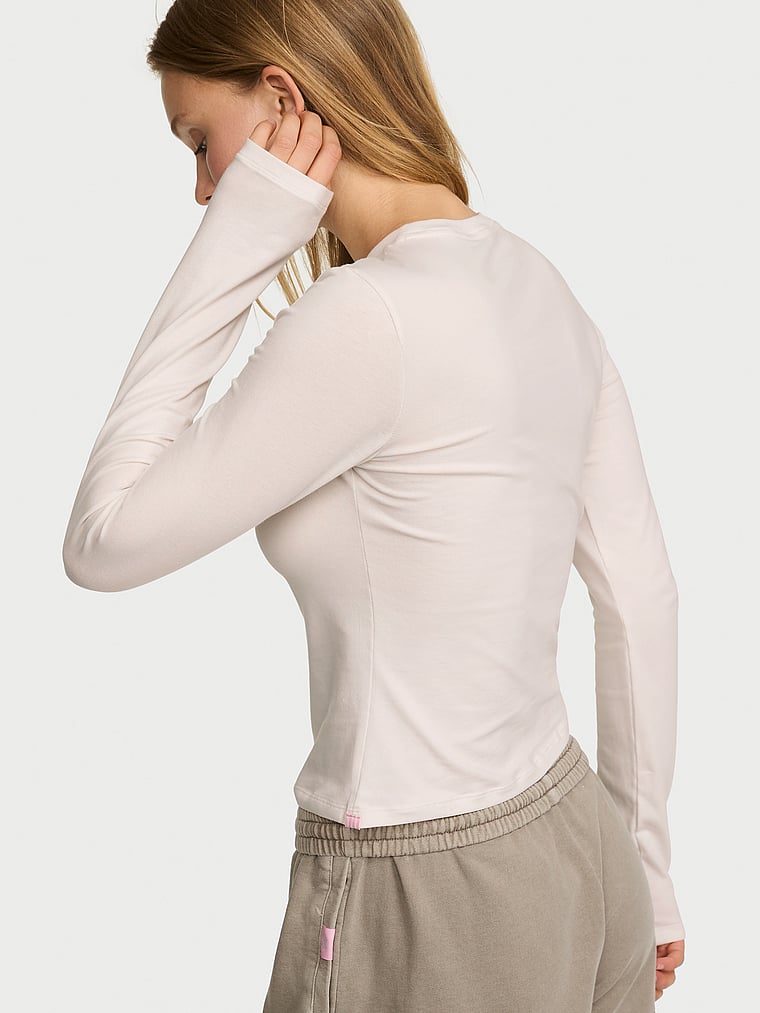 Victoria's Secret, Angel Essentials Stretch Cotton Fitted Long-Sleeve Tee, Coconut White Hembiter, onModelBack, 2 of 3