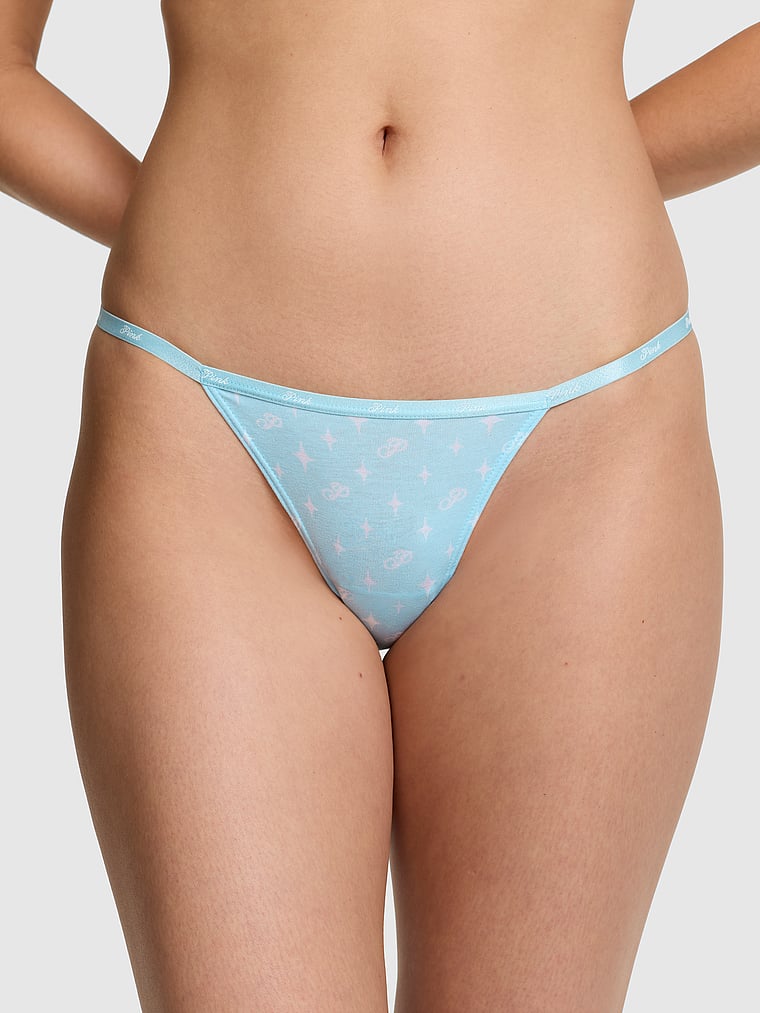 PINK Logo Cotton Ultra Low-Rise Thong Panty, Stream with Star and P, onModelFront, 1 of 2 Gloria is 5'9" and wears Small