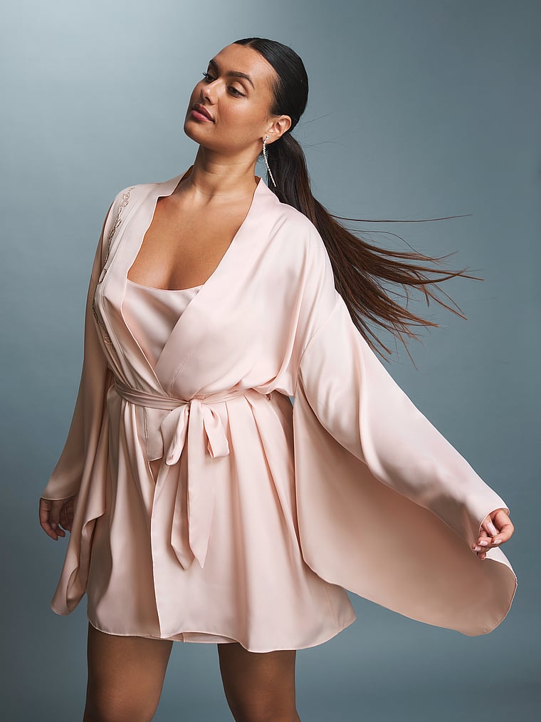 Victoria's Secret, Dream Angels Twinkle Satin Bow Short Wide-Sleeve Robe, Sheer Blush, onModelBack, 1 of 4 Karmi is 5'10" or 178cm and wears Large