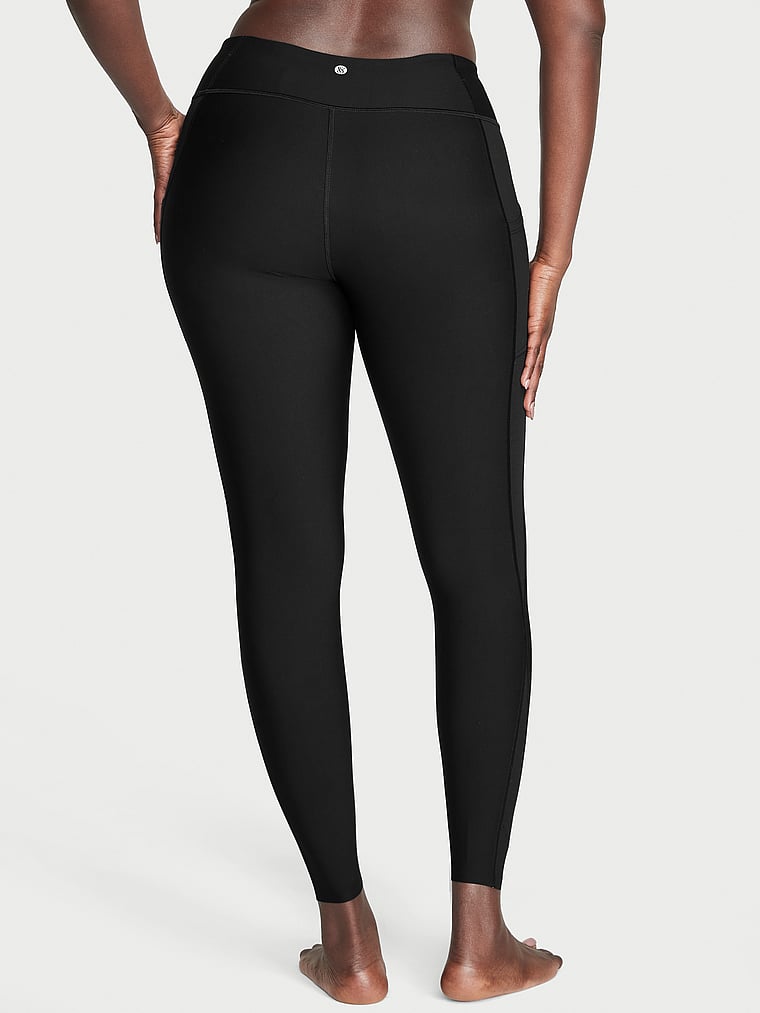 Victoria's Secret, Victoria's Secret Total Knockout Mid-Rise Perforated Legging, BLACK, onModelBack, 2 of 6 Arame is 5'11" and wears Medium