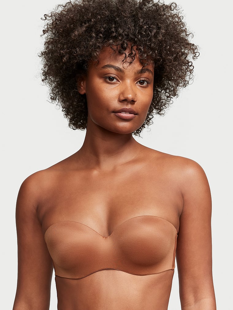 Victoria's Secret, Body by Victoria Lightly Lined Strapless Bra, Caramel, onModelFront, 1 of 3 Ange-Marie is 5'10" and wears 34B or Small
