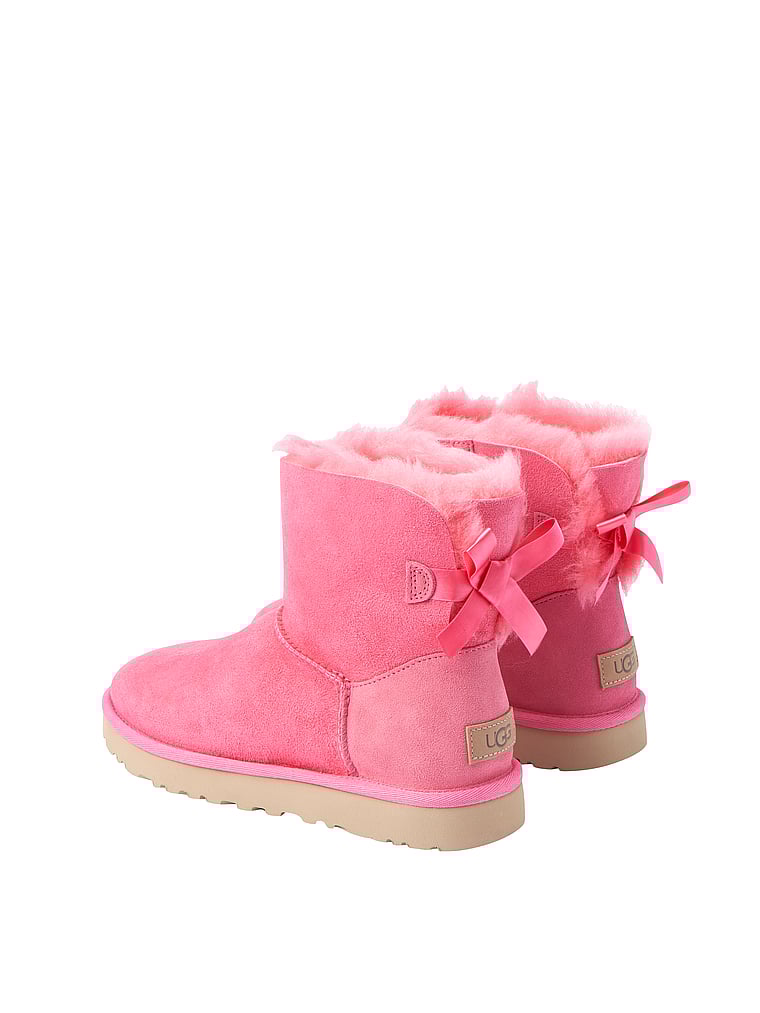 black vinyl knee high boots