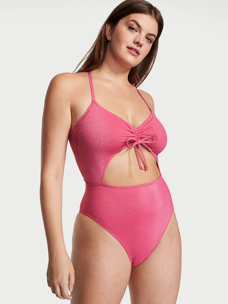Victoria's Secret, Victoria's Secret Swim Ruched Shine Cutout One-Piece Swimsuit, Forever Pink, onModelFront, 1 of 3 Abbey is 5'10" and wears Medium