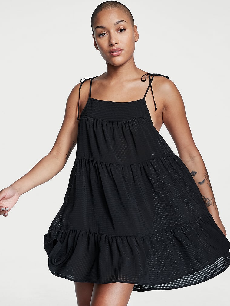 Victoria's Secret, Victoria's Secret Swim Tiered Mini Dress Coverup, Black, onModelFront, 1 of 4 Dash is 5'4" and wears 34B or Small