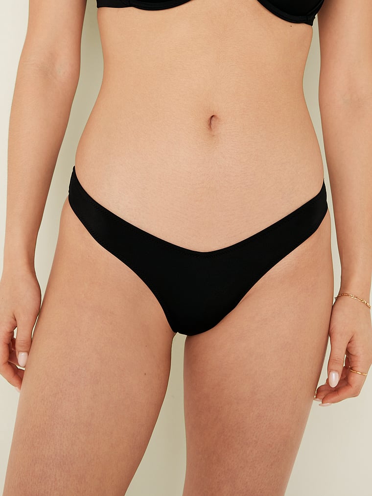 PINK V-Front Itsy Bikini Bottom, Pure Black, onModelSide, 2 of 7 Aalyah is 5'10" or 178cm and wears Small