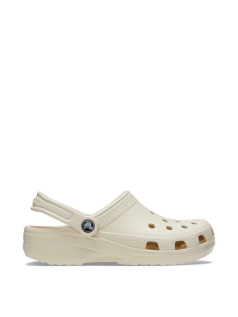 Crocs Classic Solid Clogs, Bone, onModelSide, 1 of 4