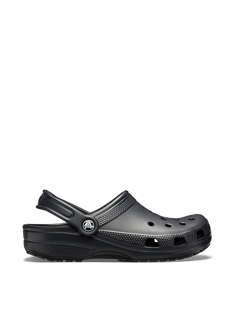 Crocs Classic Solid Clogs, Black, onModelSide, 1 of 3