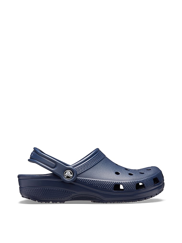 Crocs Classic Solid Clogs, Navy, onModelSide, 1 of 4