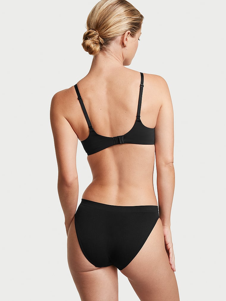 Victoria's Secret, Seamless Seamless Bikini Panty, Black, onModelBack, 2 of 3 Maggie is 5'7" and wears Small